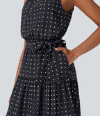 Robe mi-longue fluide de vacances à pois avec col licou, découpe dos, ceinture et poches latérales