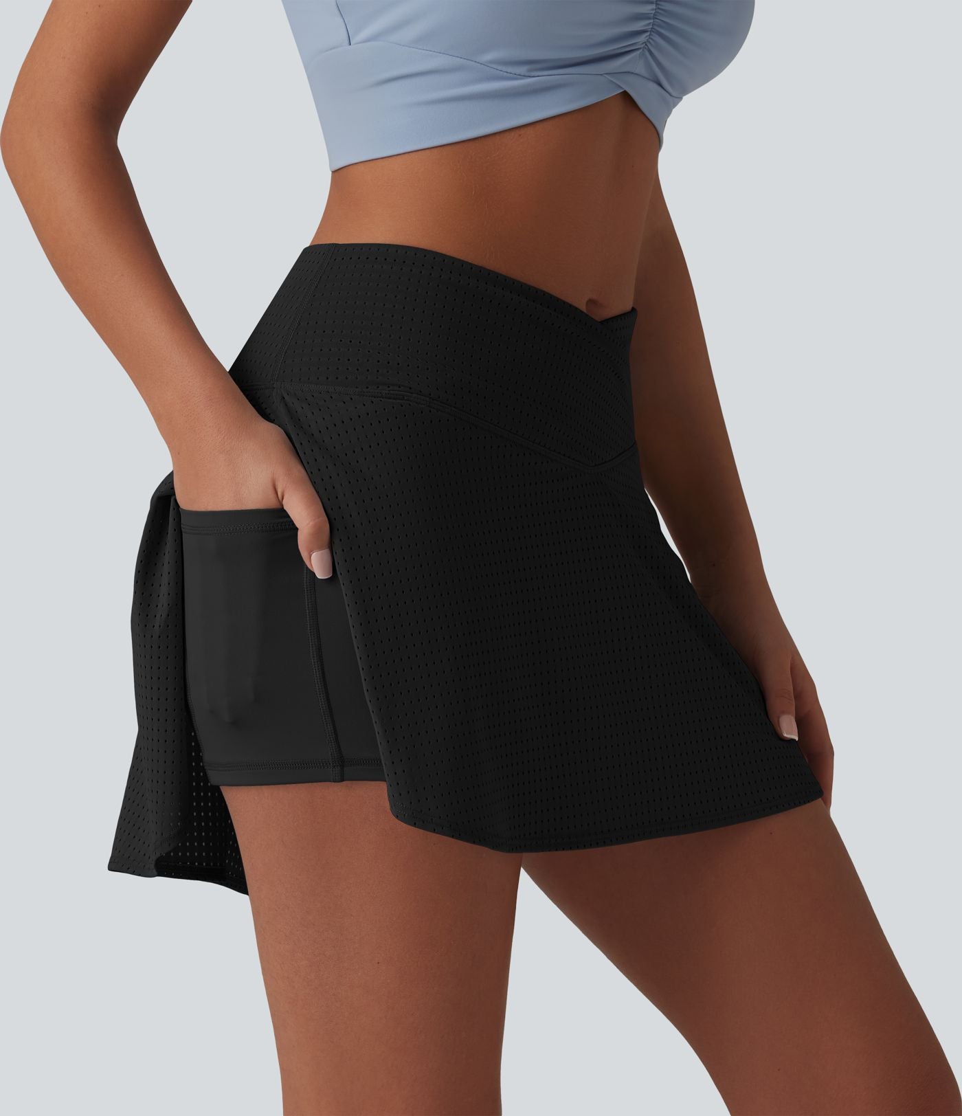 Jupe mini de tennis à œillets, taille haute, 2 en 1, coupe trapèze, croisée, avec poches
