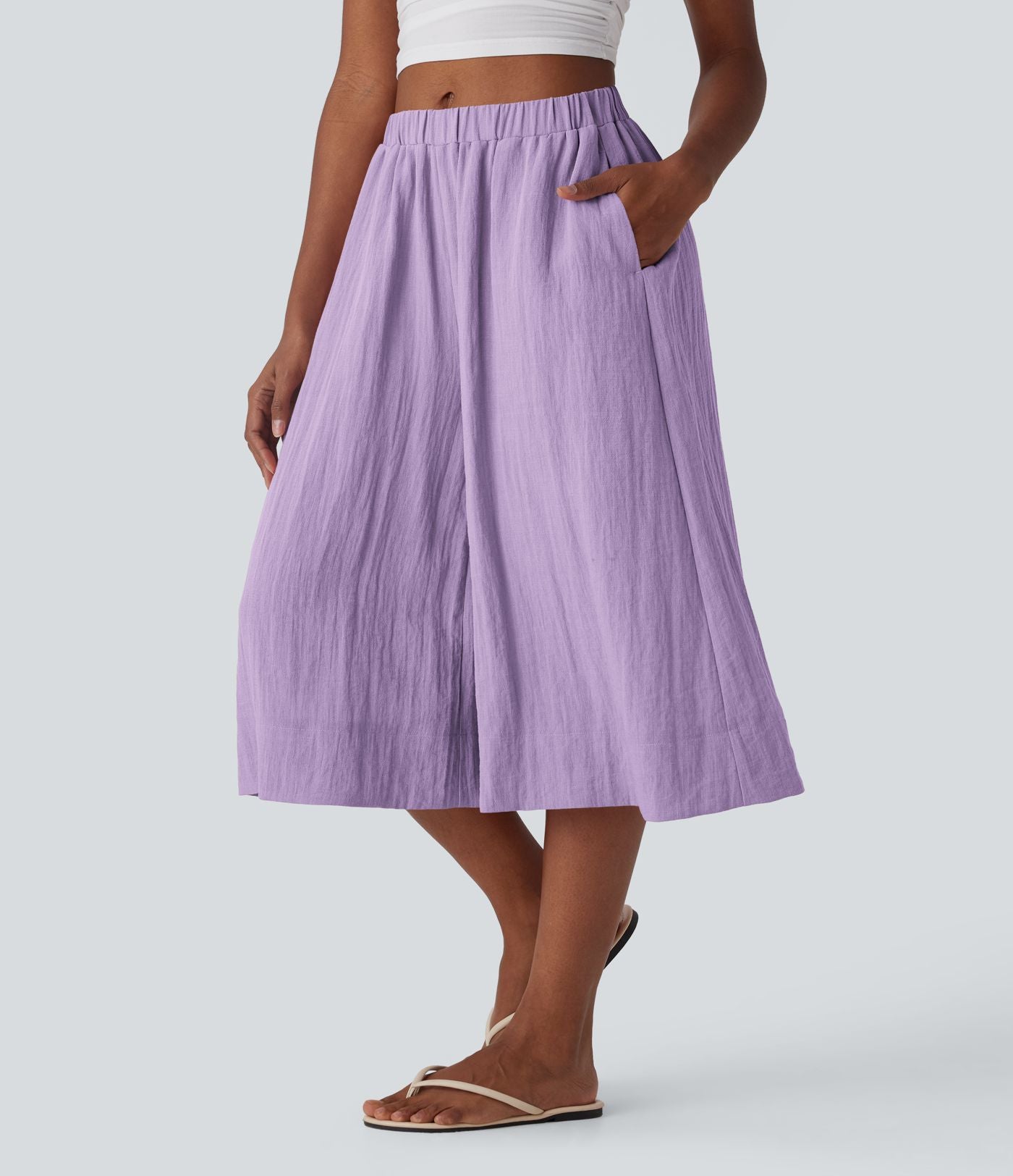 Pantalon fluide large taille mi-haute effet lin avec poche