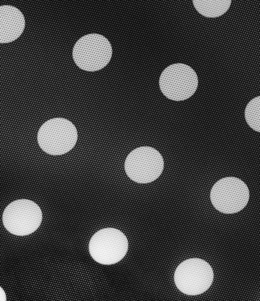 Jupe évasée micro-mini en maille à pois, taille haute, à nouer sur le côté et poche