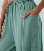 Pantalon Large Fluide Taille Mi-Haute Taille Élastique Cordon Poches Latérales Ourlet Flottant