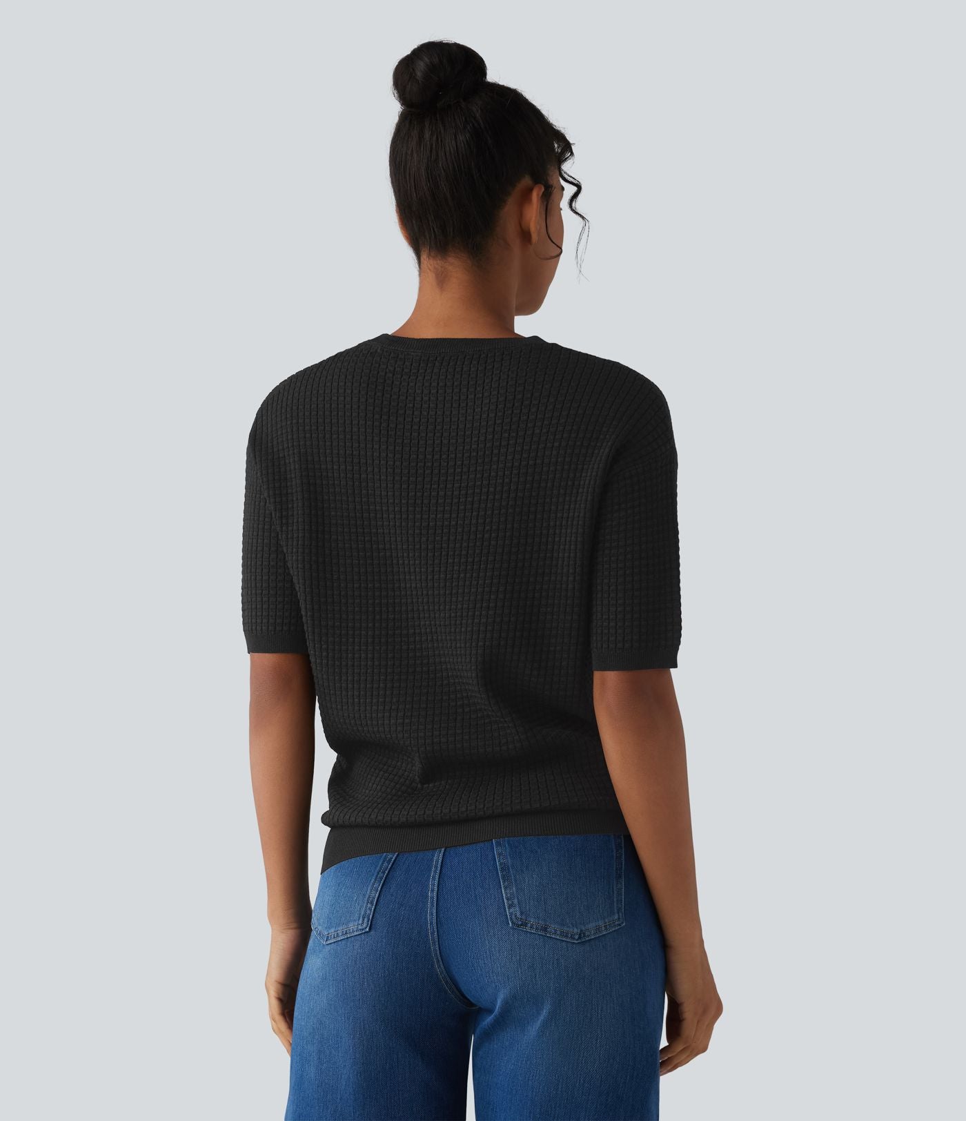 Pull col rond manches courtes en tissu gaufré