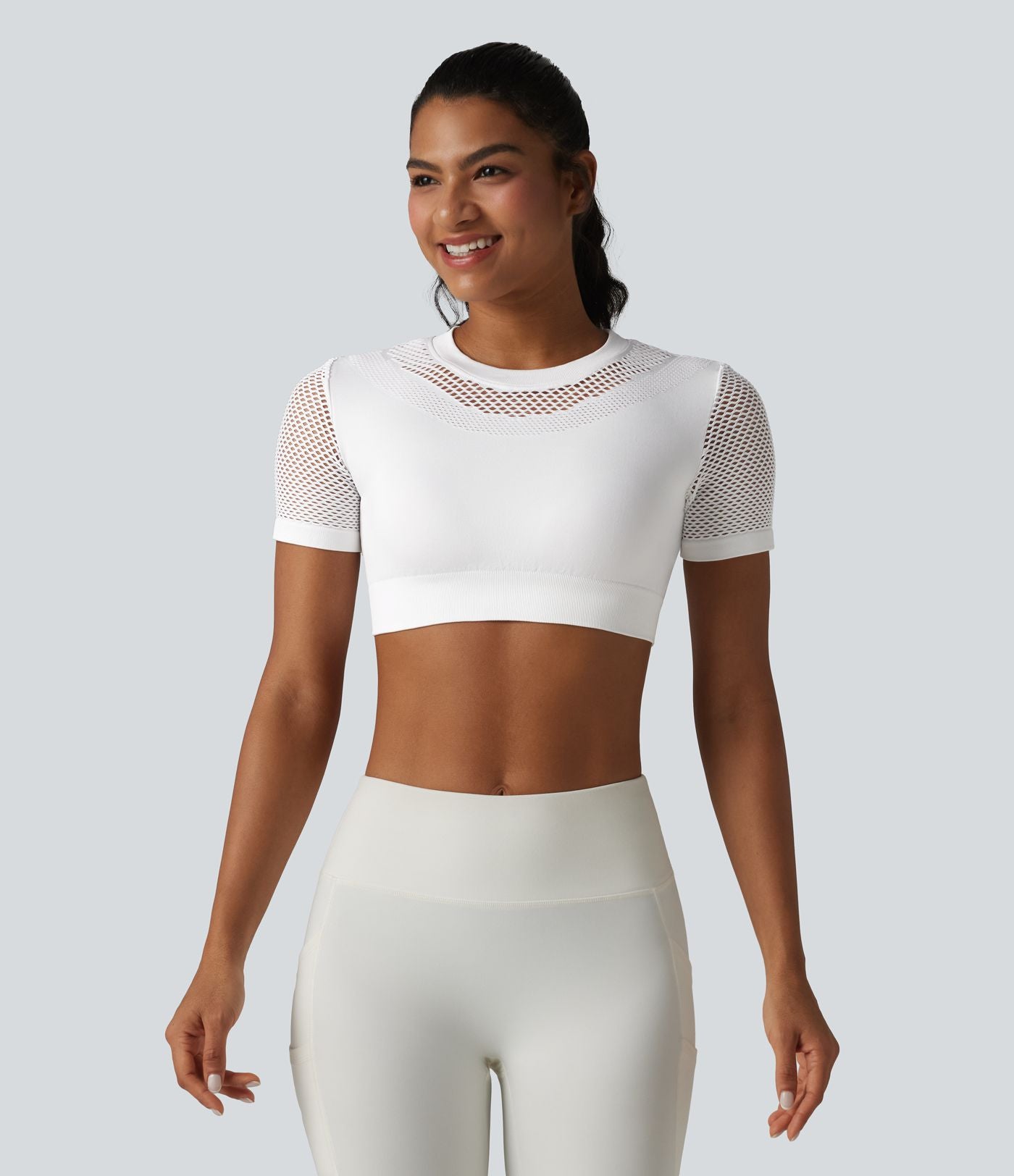 OneForm Seamless Flow Haut de sport crop col rond manches courtes avec découpes