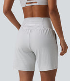 Short yoga 2-en-1 à rayures taille super haute 17,5 cm avec poches