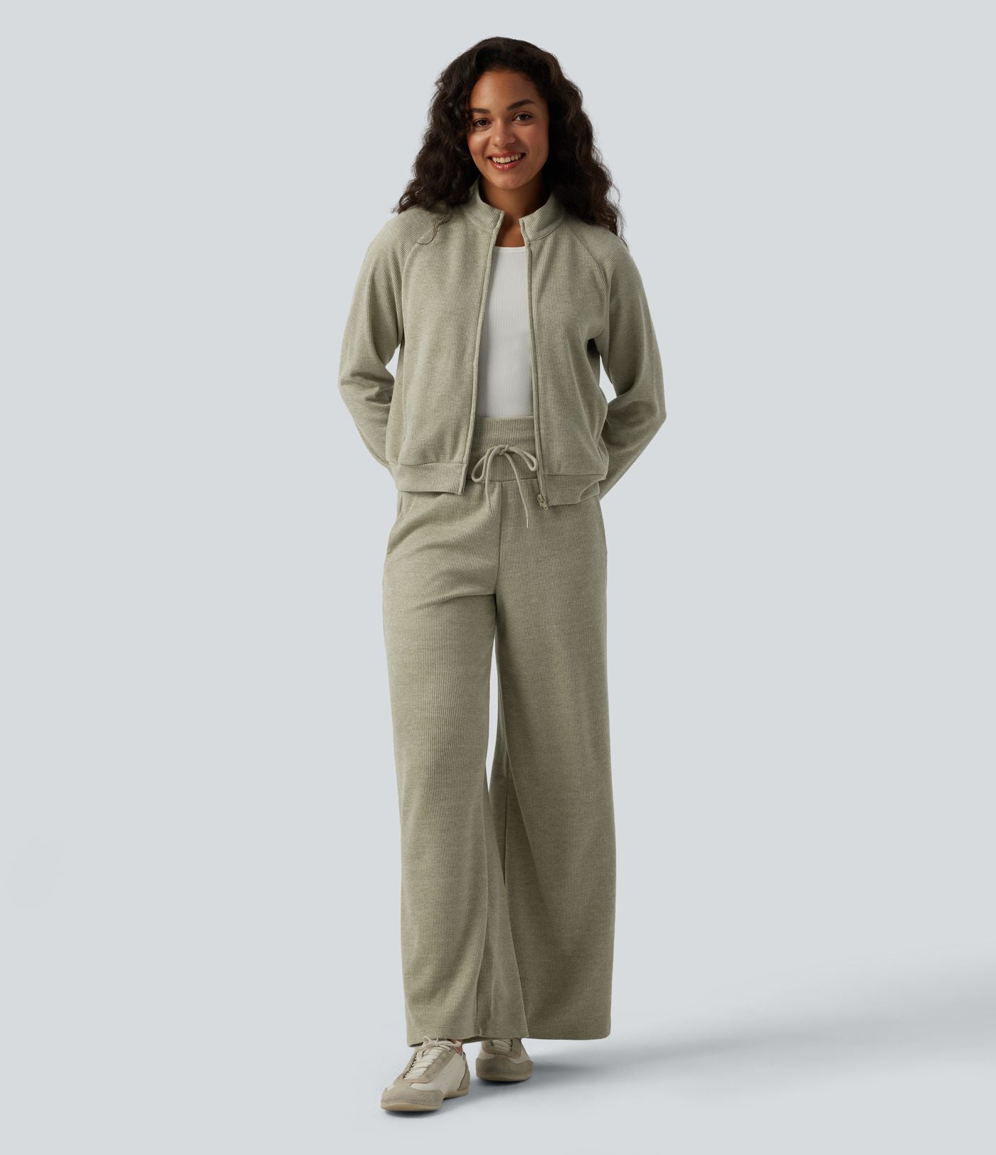 Veste casual côtelée à col montant, manches longues et fermeture zippée avec poches