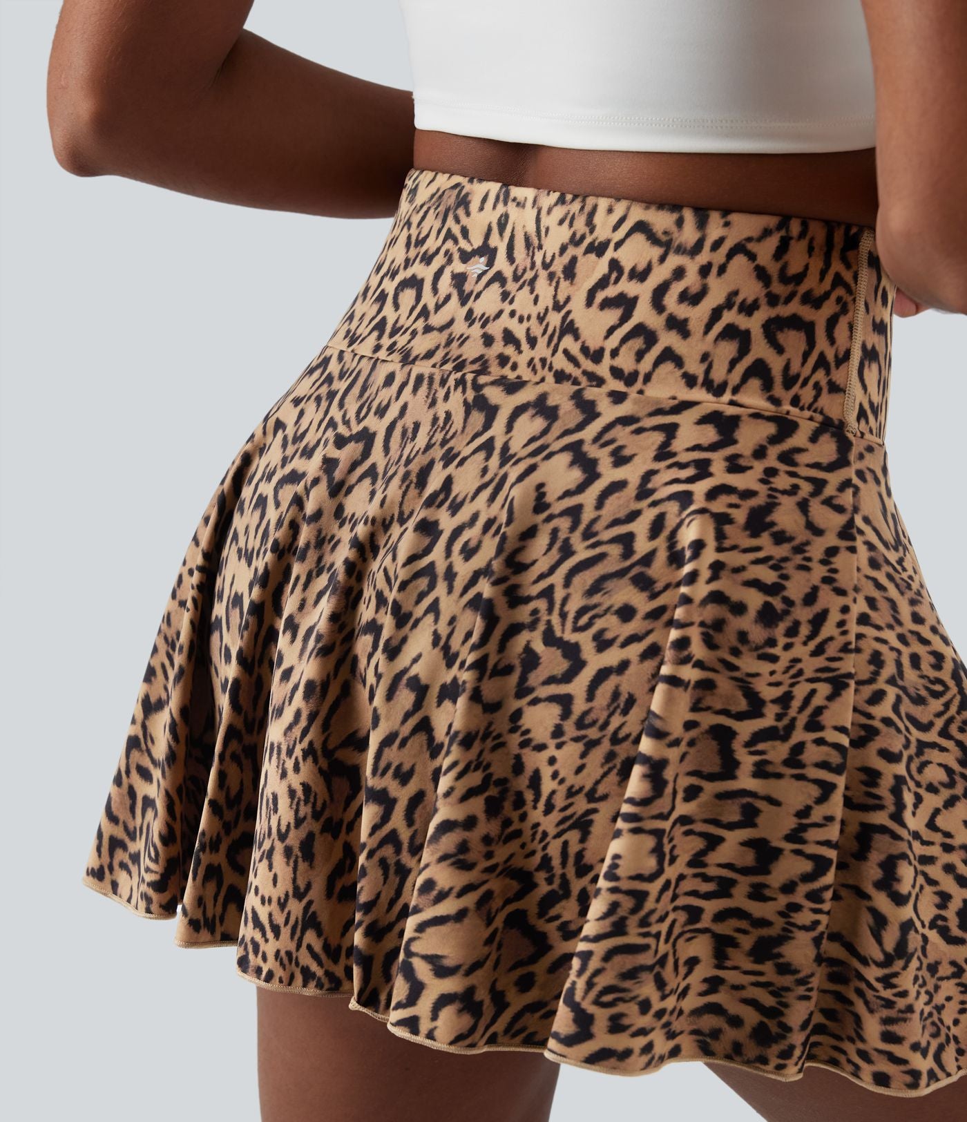 Jupe-short de tennis mini taille haute évasée imprimé léopard avec poches