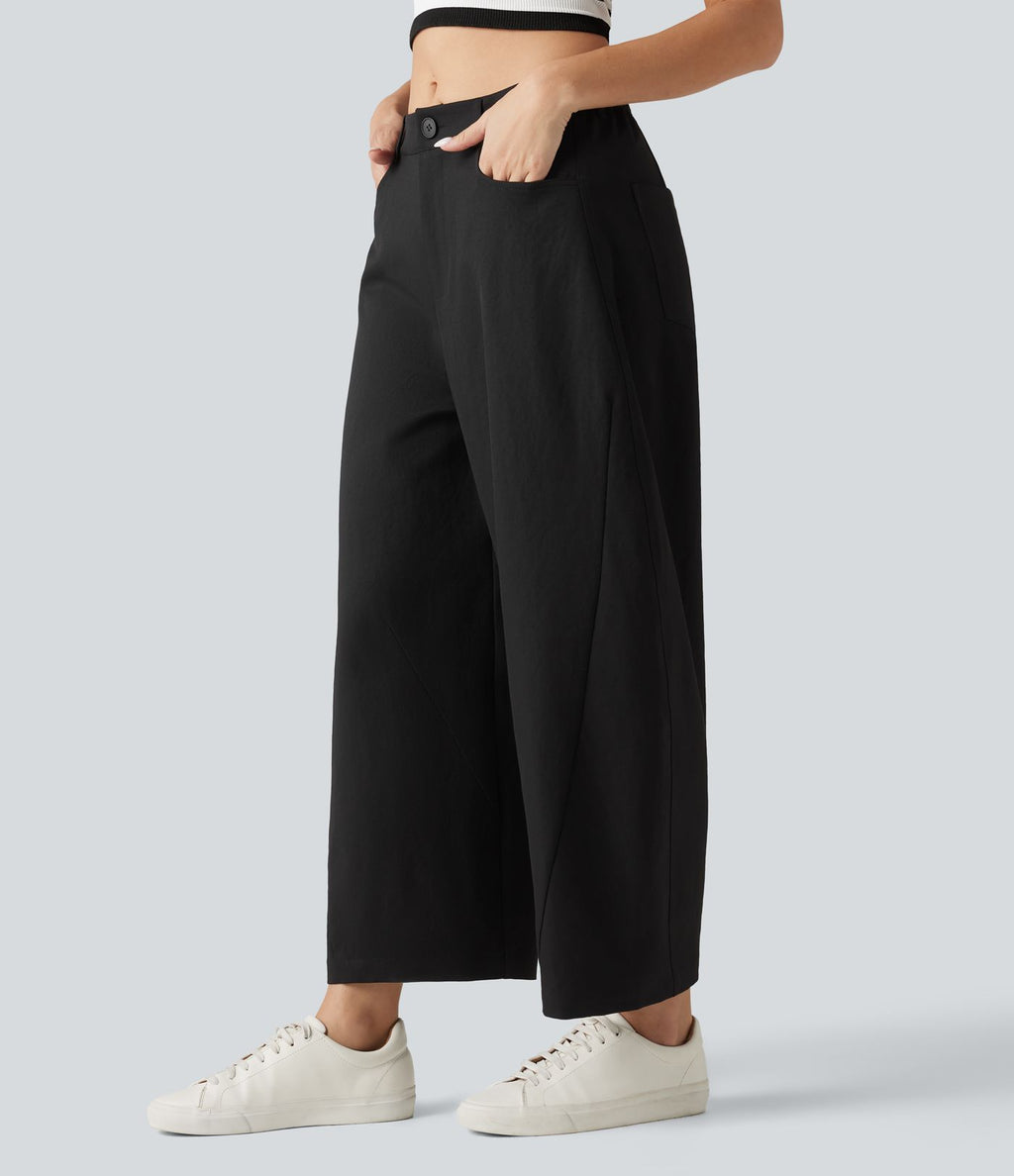 Pantalon décontracté à taille mi-haute, coupe ample et jambes fuselées, avec poches