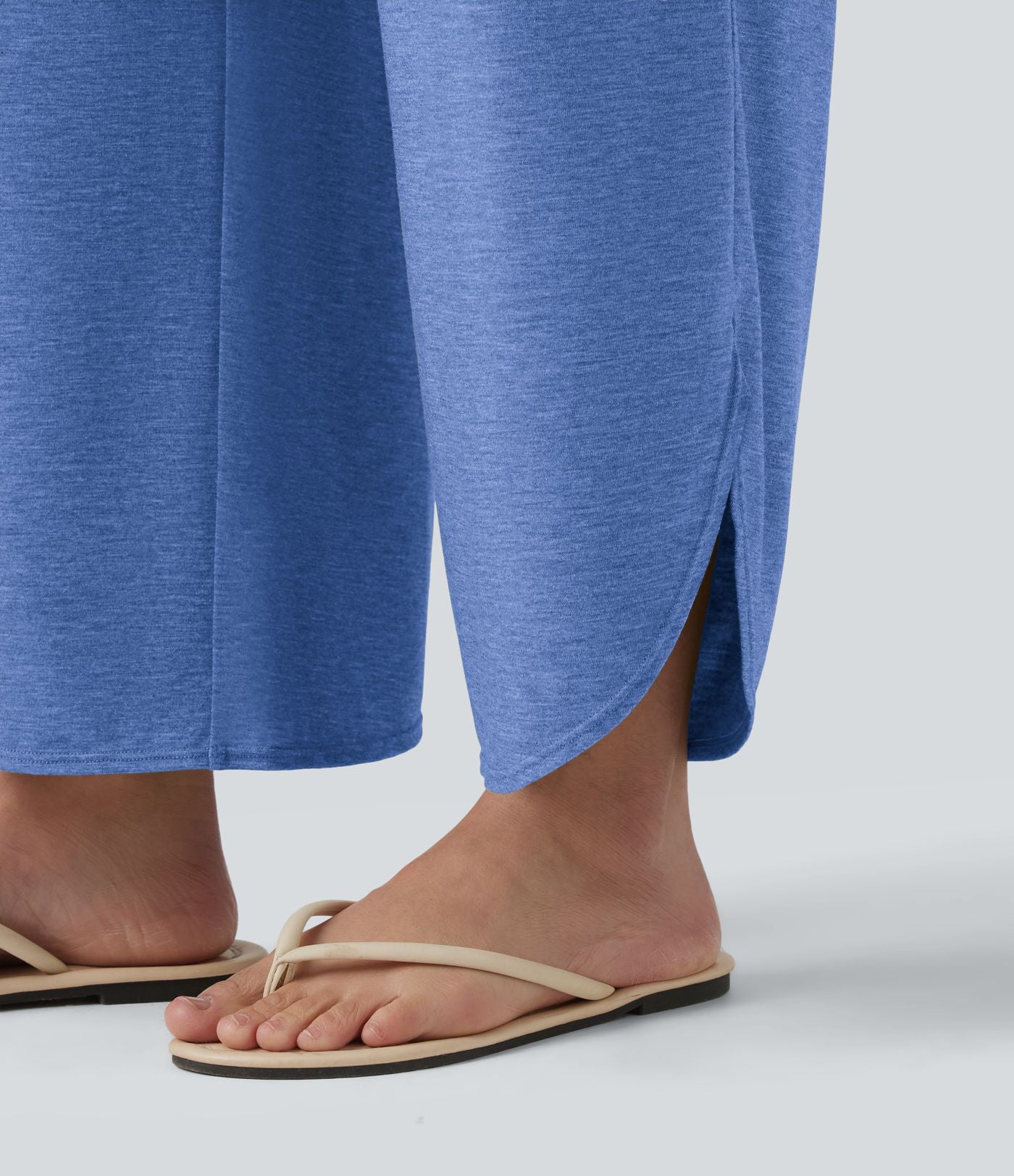 Pantalon décontracté taille haute gainant avec ourlet arrondi et poches