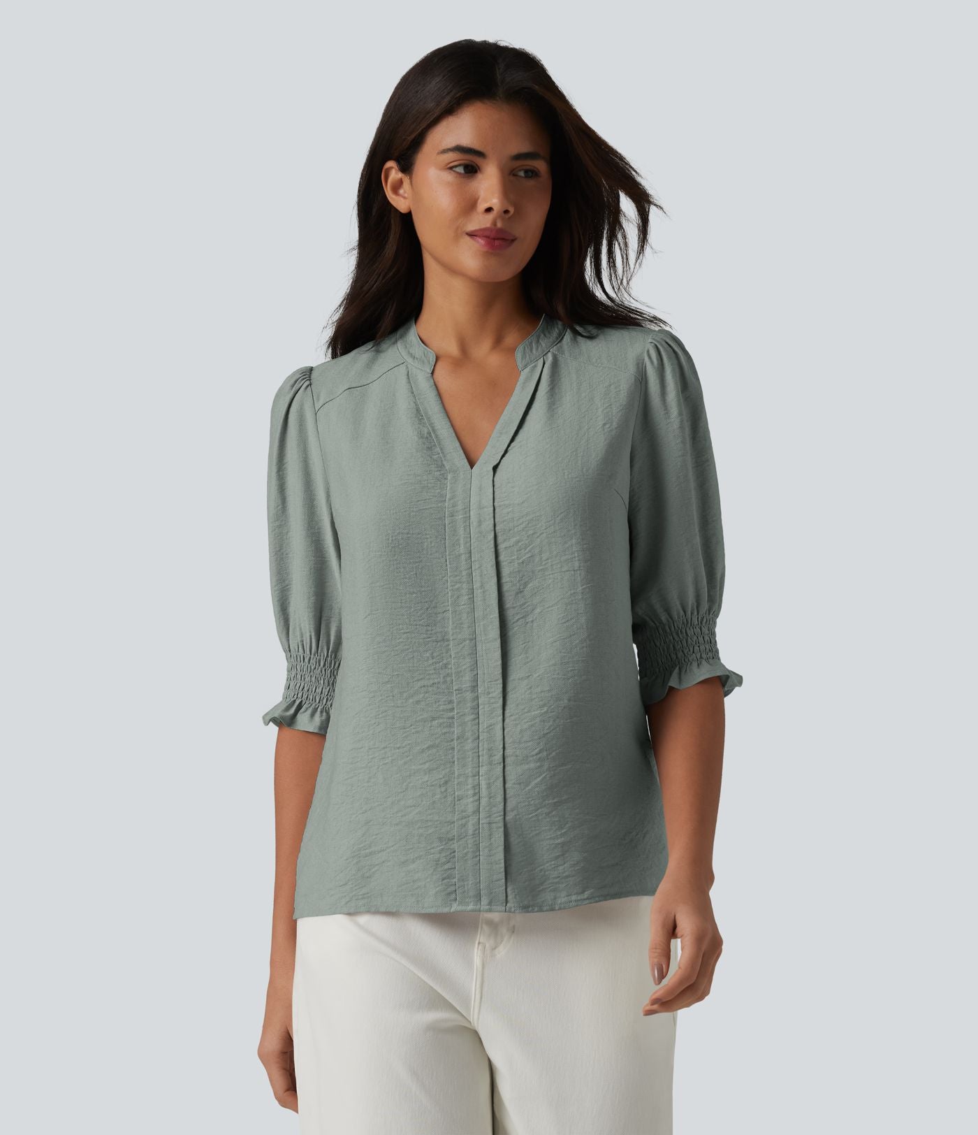 Blouse décontractée à col en V et manches courtes bouffantes