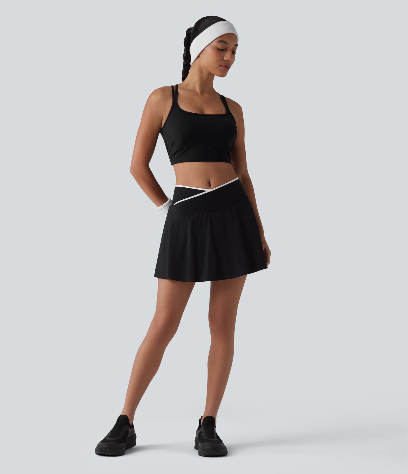 Jupe de tennis mini 2-en-1 color block croisée taille mi-haute avec poches