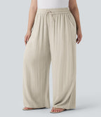Pantalon décontracté grande taille large fluide taille haute effet lin avec cordon de serrage et poches