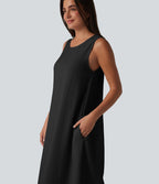 Robe débardeur midi unie sans manches à col rond et poches