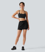 Jupe-short de sport mini SoftlyZero™ Airy taille mi-haute à ourlet croisé, toucher frais, cordon ajustable et poches