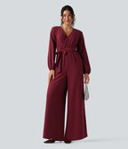 Combinaison pantalon de soirée large à décolleté en V, manches longues bouffantes, ceinture et poches