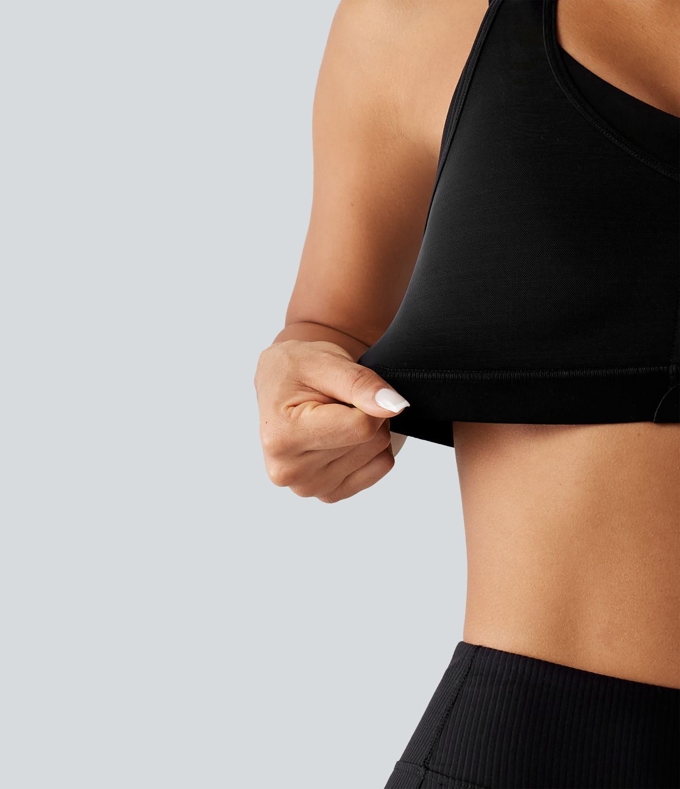 Brassière de sport d'entraînement maintien moyen col rond échancré dos nageur avec fermeture éclair, mesh contrasté et coussinets non amovibles