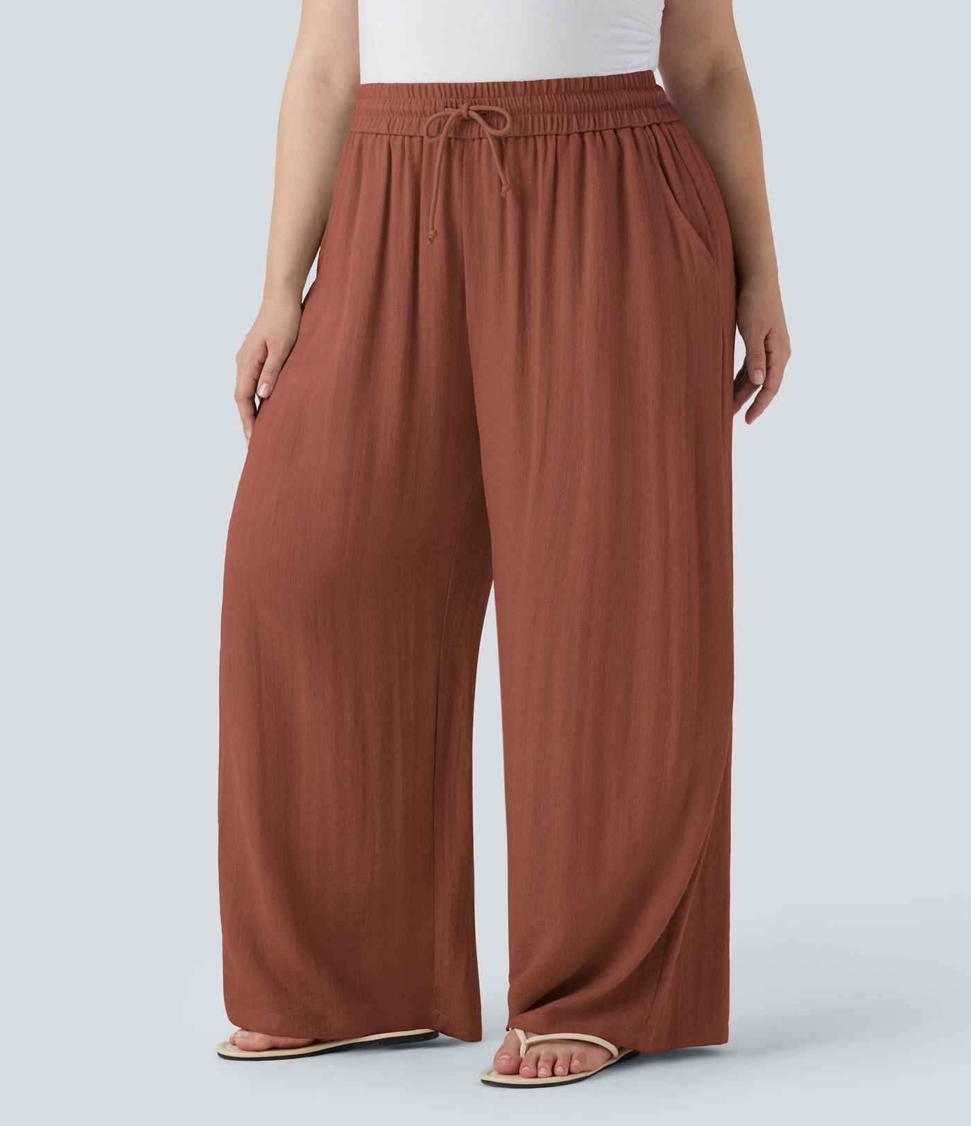 Pantalon décontracté grande taille large fluide taille haute effet lin avec cordon de serrage et poches
