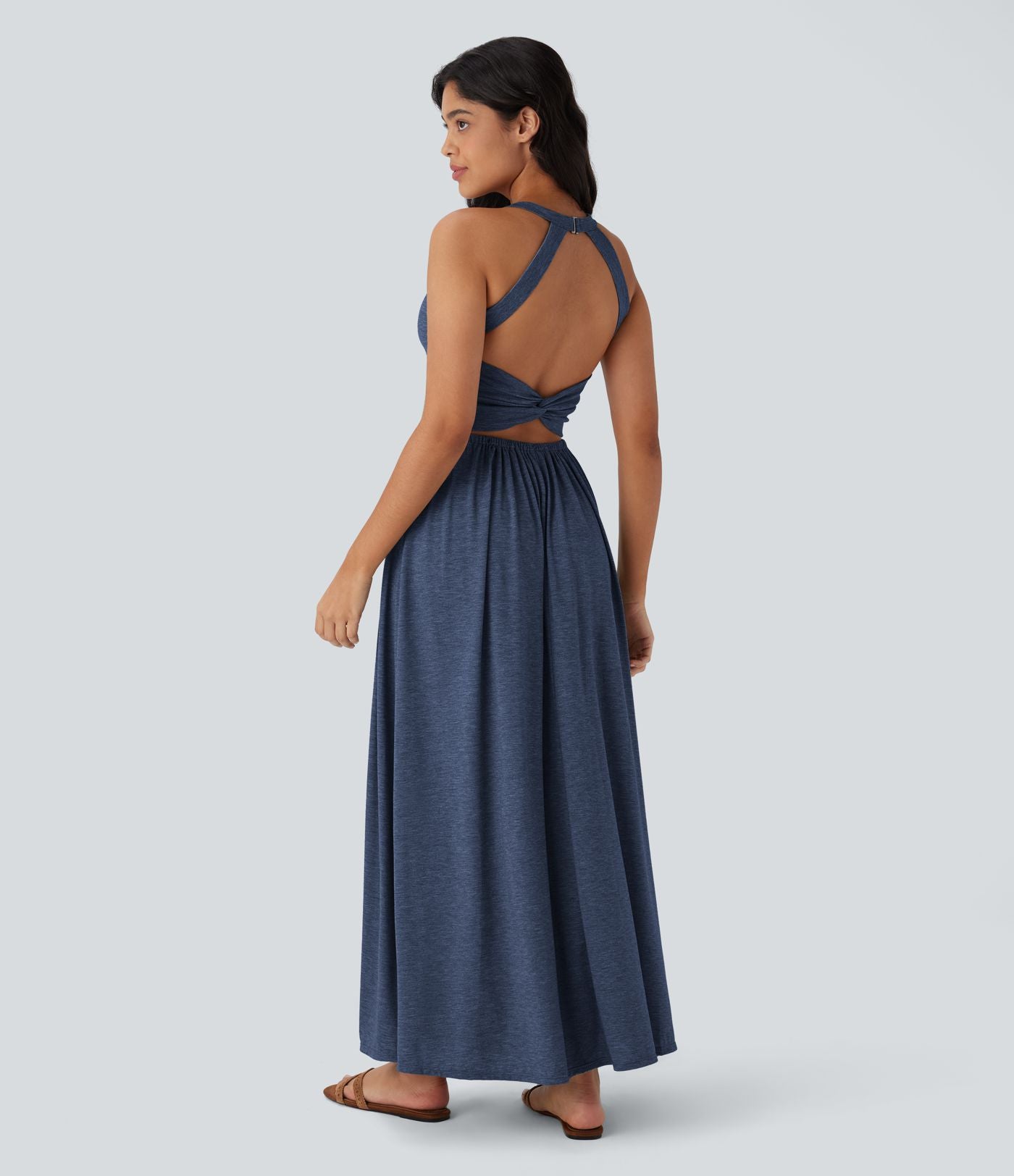 Robe longue fluide fendue avec poches latérales, dos nu et effet torsadé