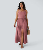 Robe longue fluide fendue avec poches latérales, dos nu et effet torsadé
