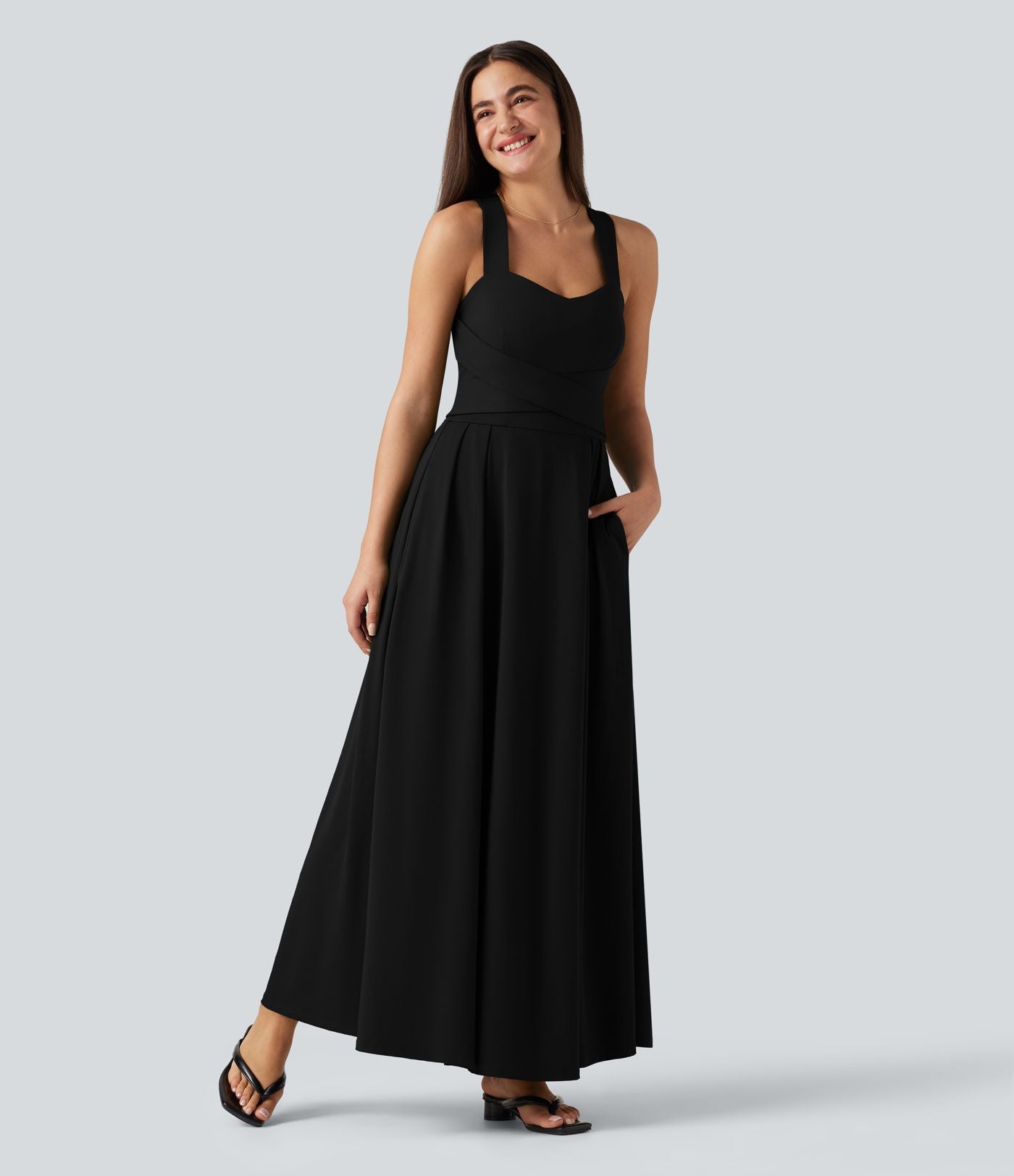 Robe longue fluide décontractée sans manches décolleté en cœur bretelles croisées avec lien dans le dos et poches