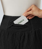 Short baggy 2-en-1 casual en tissu froissé taille haute avec poches