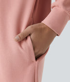 Robe Sweatshirt Casual à Capuche avec Cordon Poches Latérales Ourlet Courbé Asymétrique Oversize Mini en Tissu Gaufré