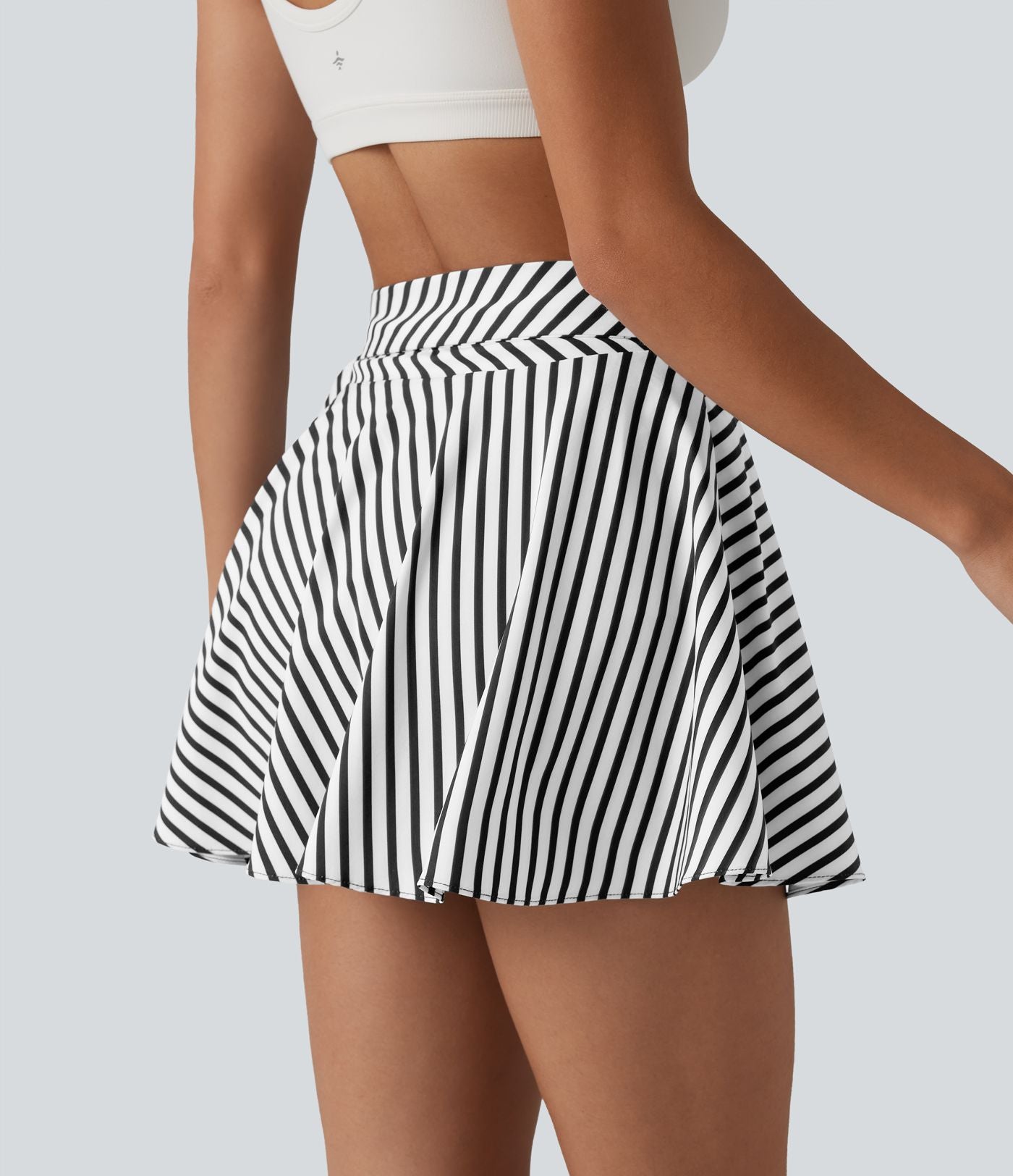 Jupe tennis mini fluide 2-en-1 taille haute imprimé léopard avec liens latéraux et poche