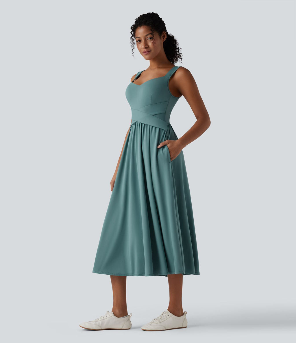 Robe midi fluide sans manches dos croisé ouvert avec poches