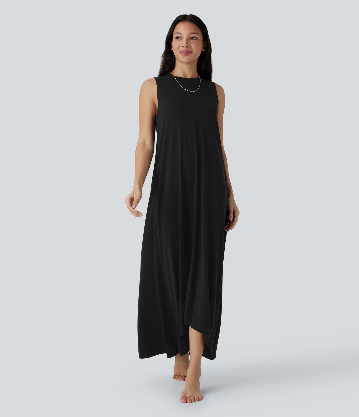 Robe longue décontractée fluide à col rond, sans manches, poches latérales et ourlet asymétrique