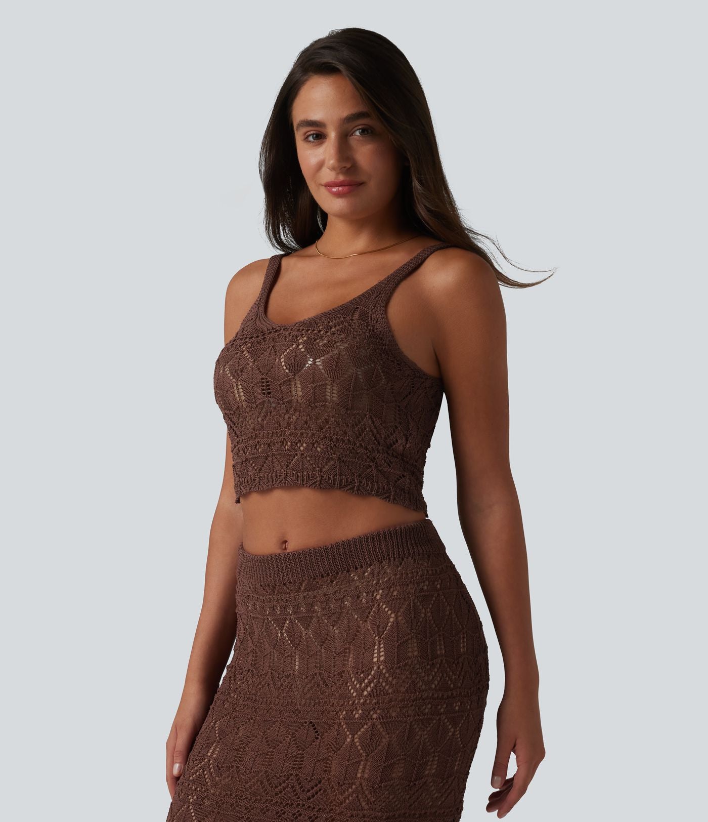 Débardeur pull crop à maille ajourée