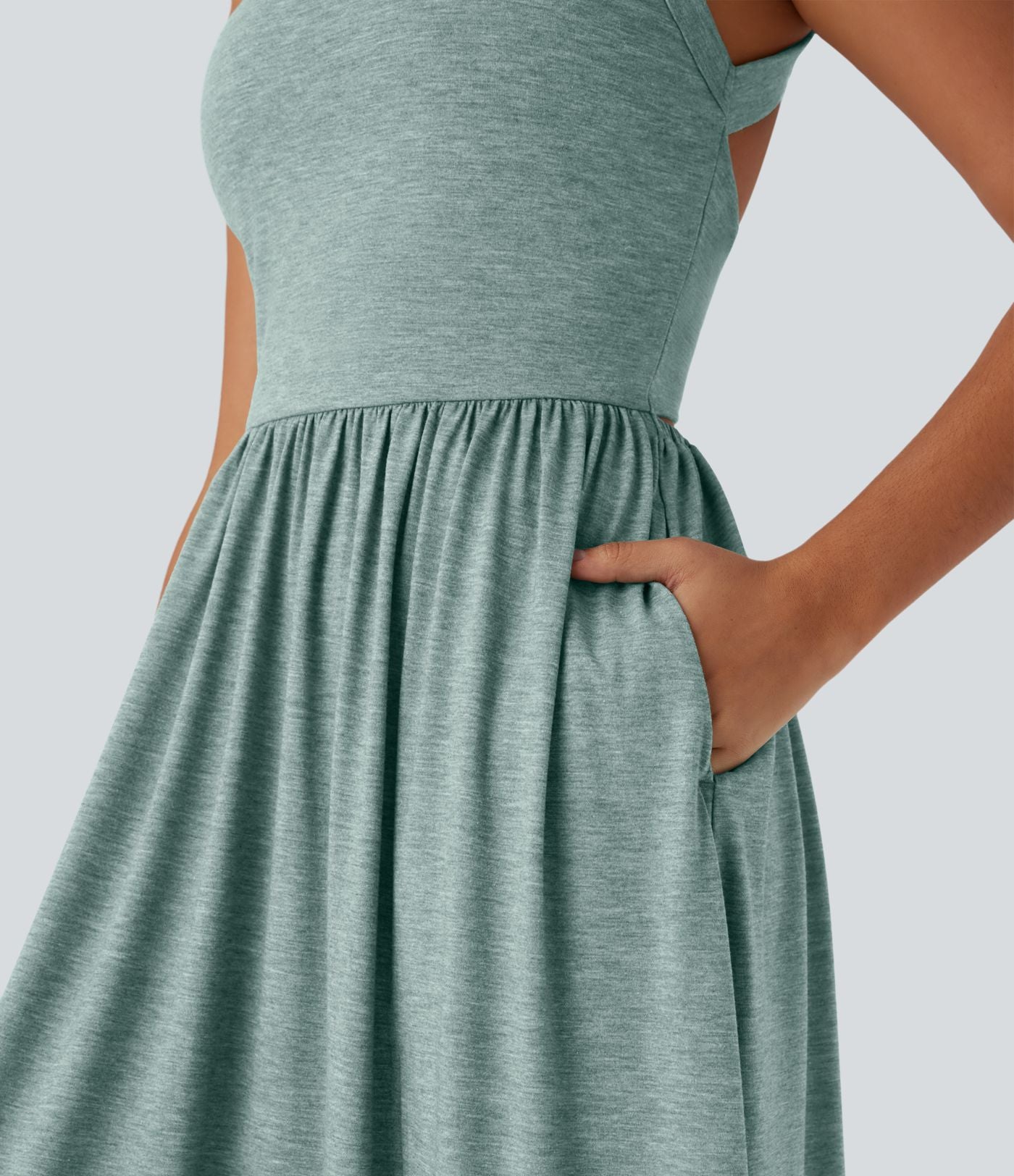 Robe longue fluide fendue avec poches latérales, dos nu et effet torsadé