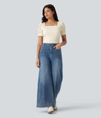 Blouse habillée col carré à manches bouffantes et tissu texturé
