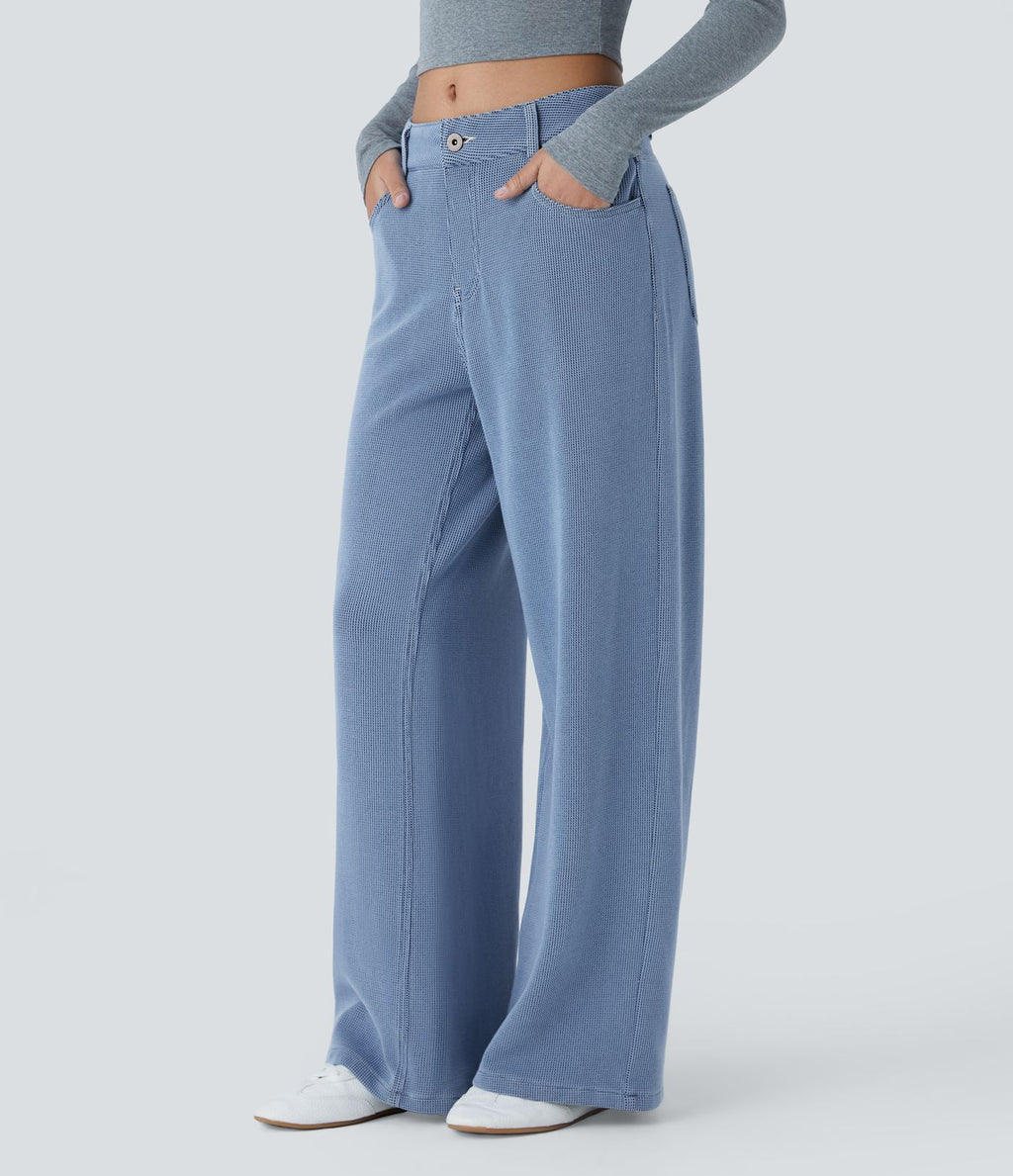 Jean décontracté taille basse en maille gaufrée extensible, jambe large avec poches multiples et fermeture zippée