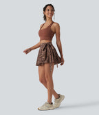 Jupe tennis mini fluide 2-en-1 taille haute imprimé léopard avec liens latéraux et poche