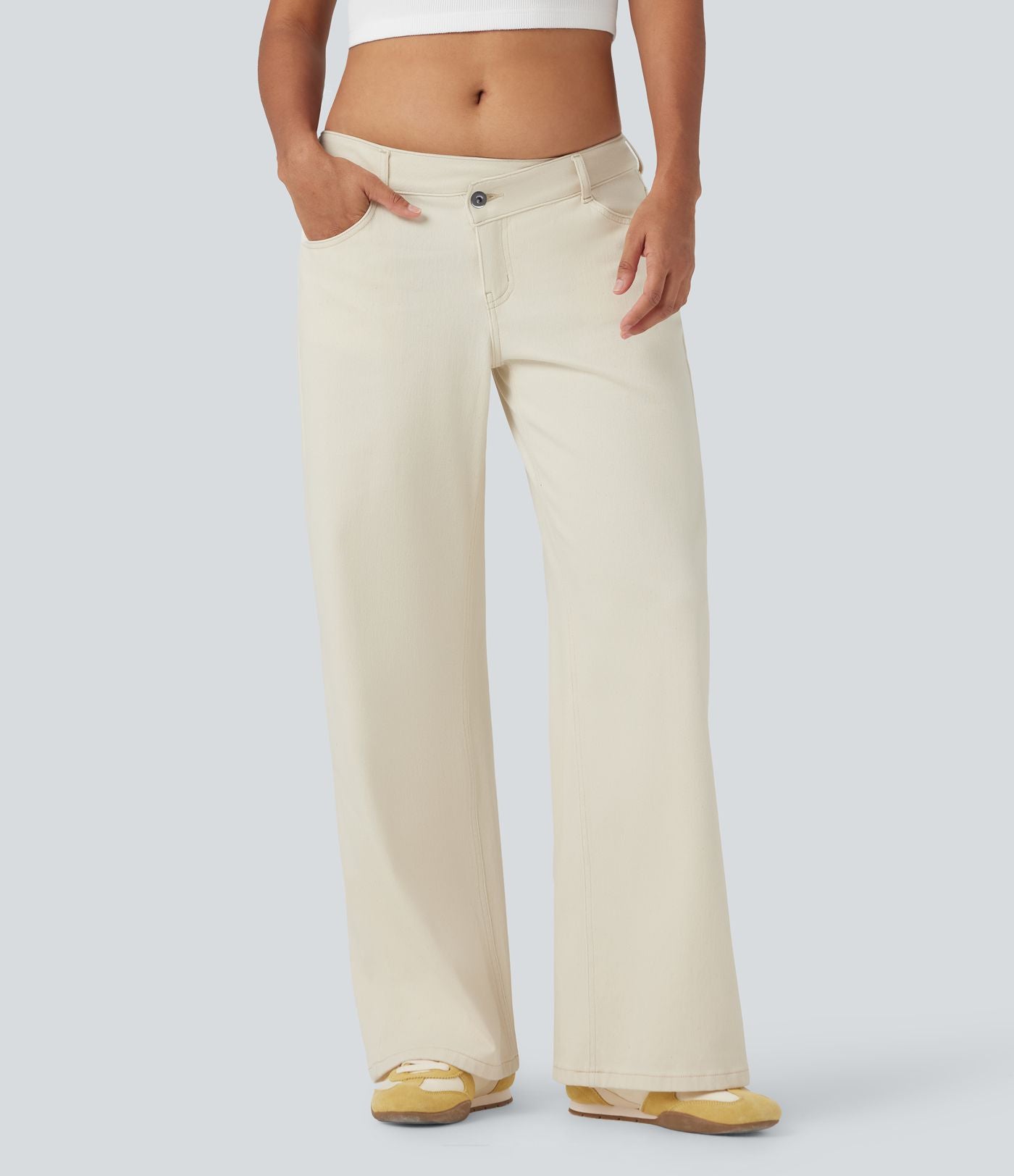 Halara Flex™ Jean large asymétrique taille basse avec bouton, fermeture éclair et poches multiples, délavé et extensible en maille