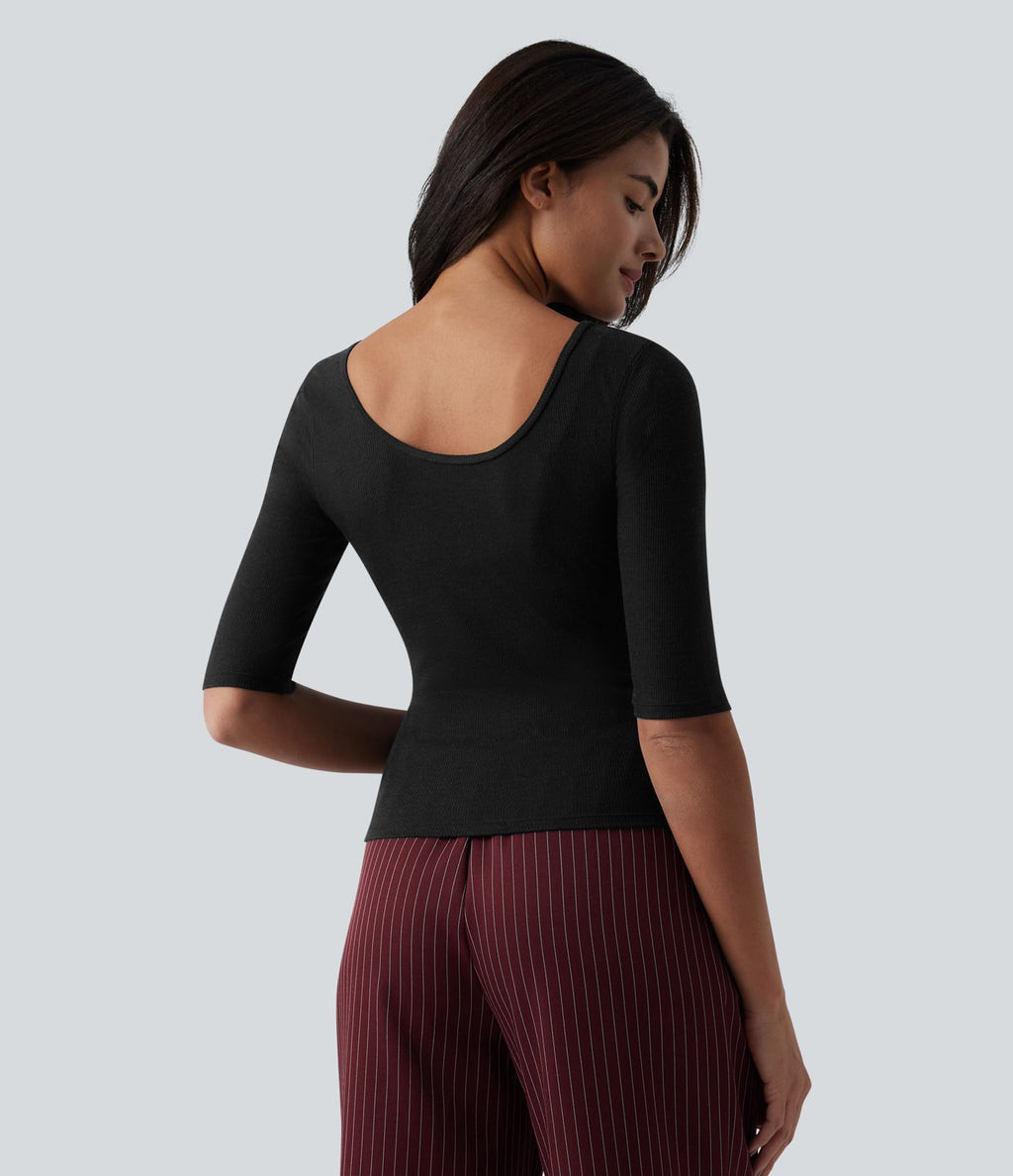 Top tailleur en mélange de laine col rond échancré à manches courtes en maille côtelée
