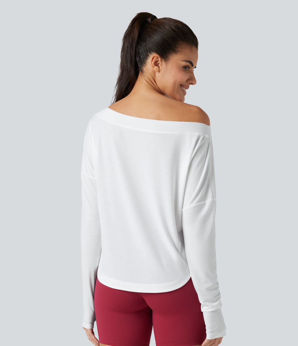 Top de sport yoga asymétrique une épaule manches longues avec trou pour le pouce, ourlet arrondi asymétrique et séchage rapide
