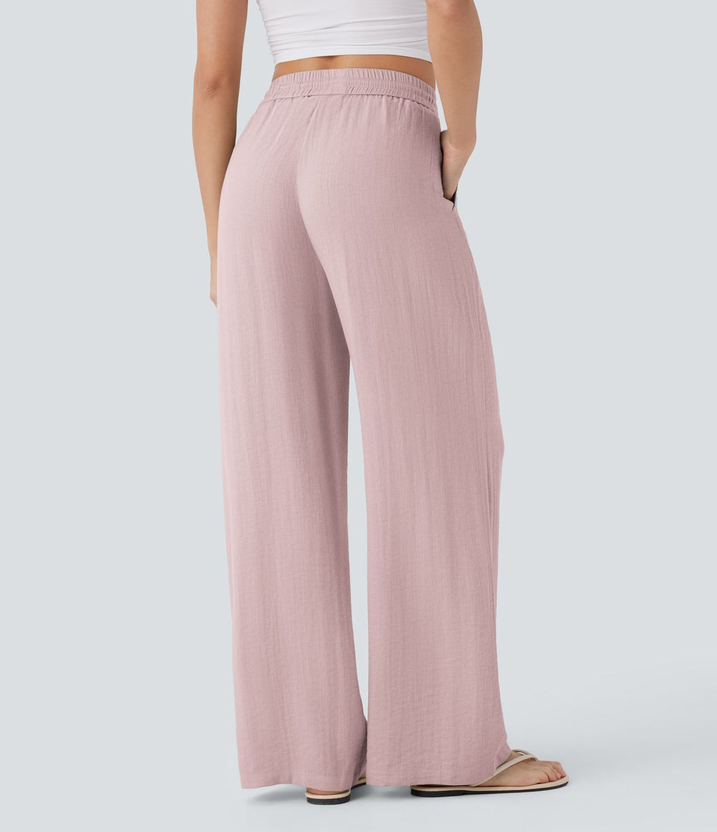 Pantalon large fluide taille haute avec cordon de serrage, poches latérales et aspect lin