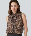 Blouse de travail en mousseline col cheminée avec nœud, sans manches, imprimé léopard