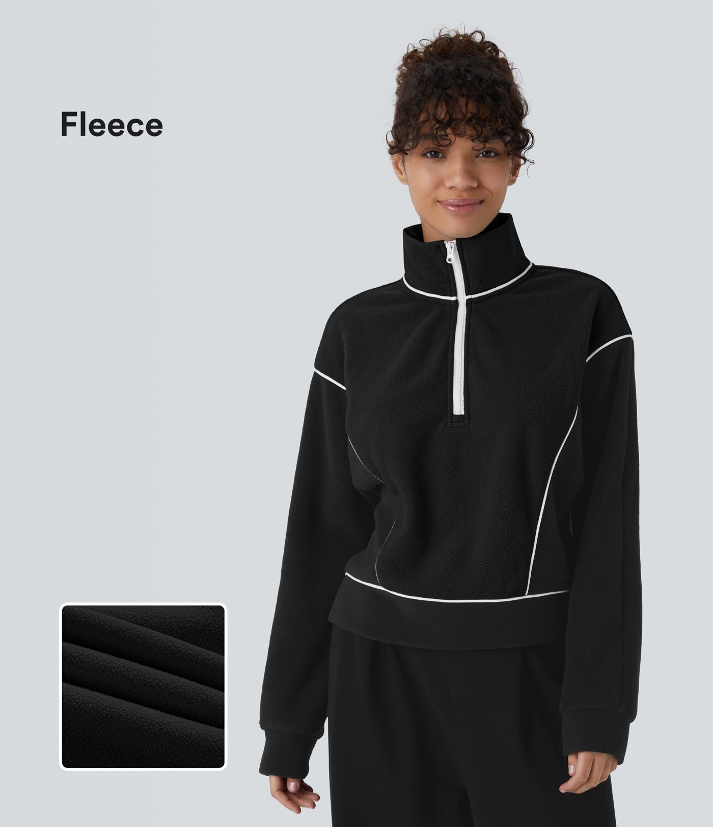 Sweat bicolore en polaire col montant avec demi-zip et manches longues