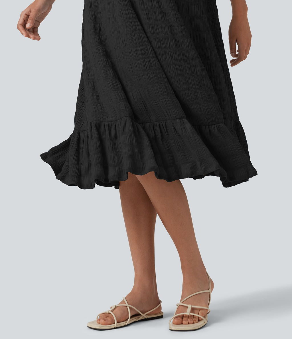 Robe midi sans manches à encolure arrondie avec coussinets amovibles et ourlet à volants