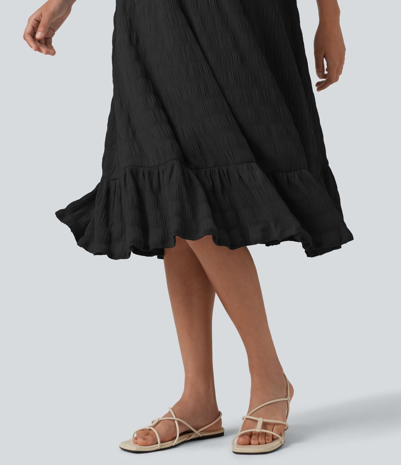 Robe midi sans manches à encolure arrondie avec coussinets amovibles et ourlet à volants