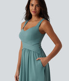 Robe midi fluide sans manches dos croisé, avec brassière intégrée (Bonnets E-G) et poches