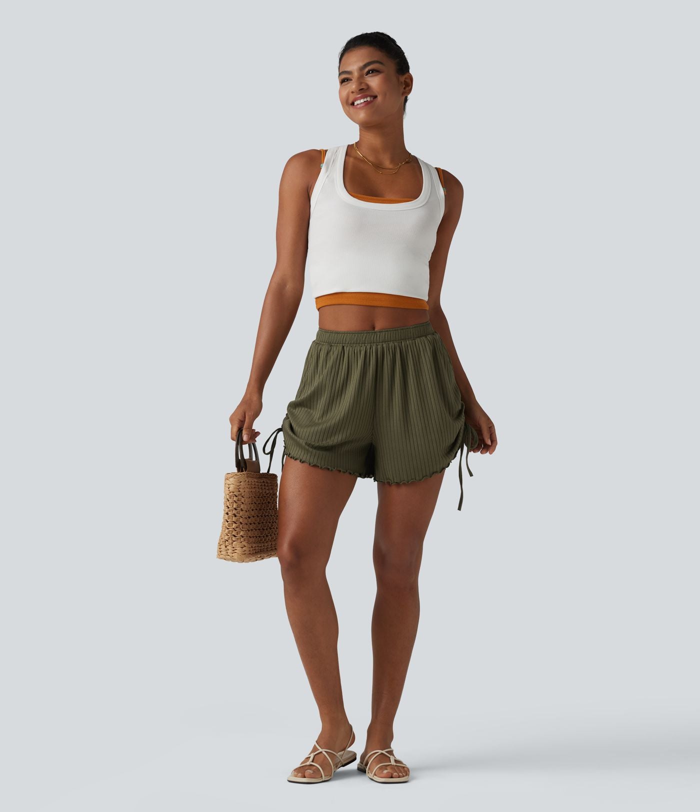 Short en maille côtelée taille mi-haute à cordon de serrage et ourlet ondulé 10 cm avec poches