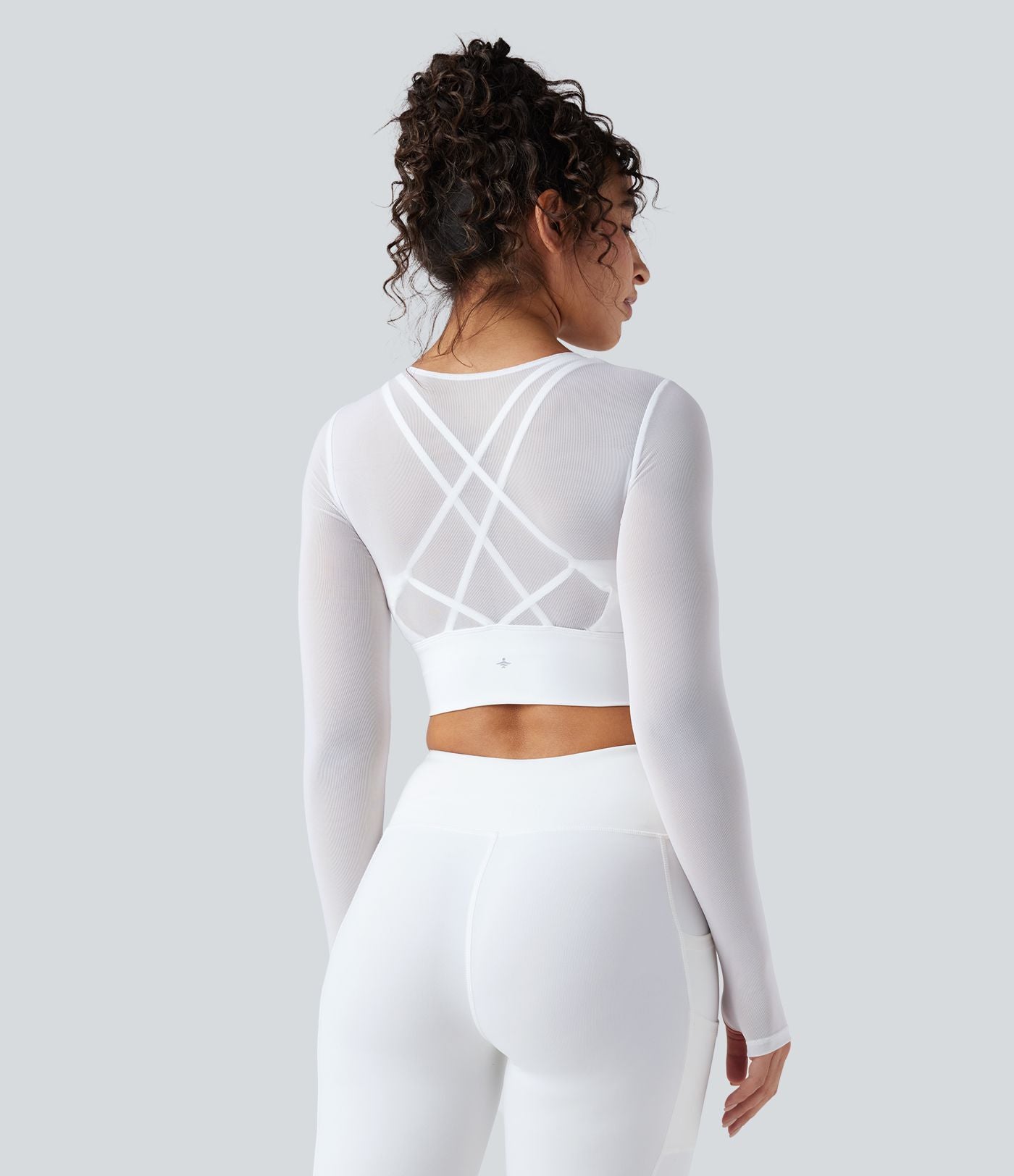 Haut de sport yoga cropped 2-en-1 manches longues mesh contrastant à trous pouces