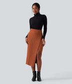 Jupe pull moulante mi-longue taille haute en maille torsadée avec fente