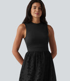 Robe midi de villégiature sans manches col rond à broderie anglaise, avec poches