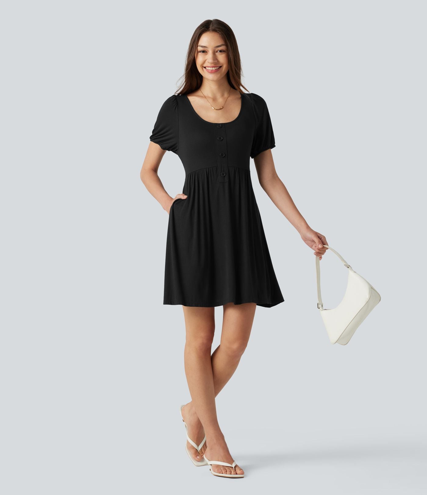 Robe décontractée mini col rond échancré manches courtes dos noué avec poches