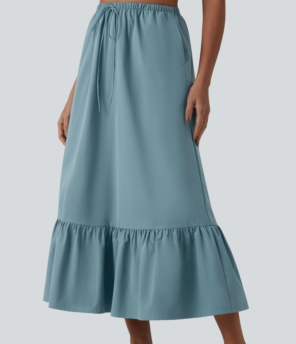 Jupe casual mi-longue évasée en popeline stretch taille haute avec cordon de serrage, ourlet volanté et poches