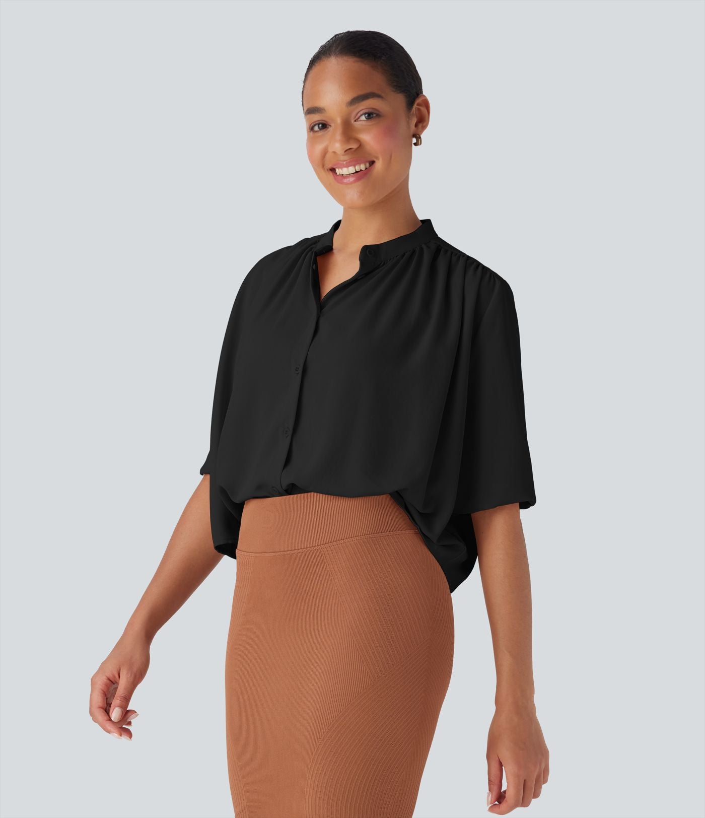 Blouse aspect lin col rond, manches mi-longues, boutonnée avec ourlet arrondi pour la détente