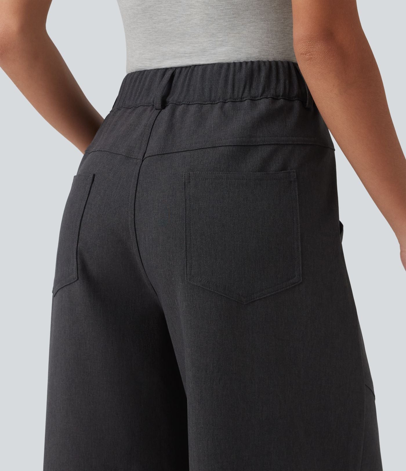 Pantalon tailleur ample taille mi-haute avec poches